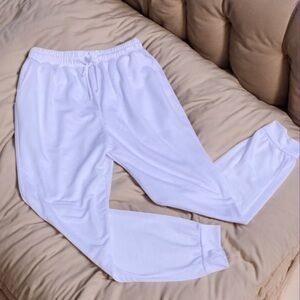 Young adults white joggers